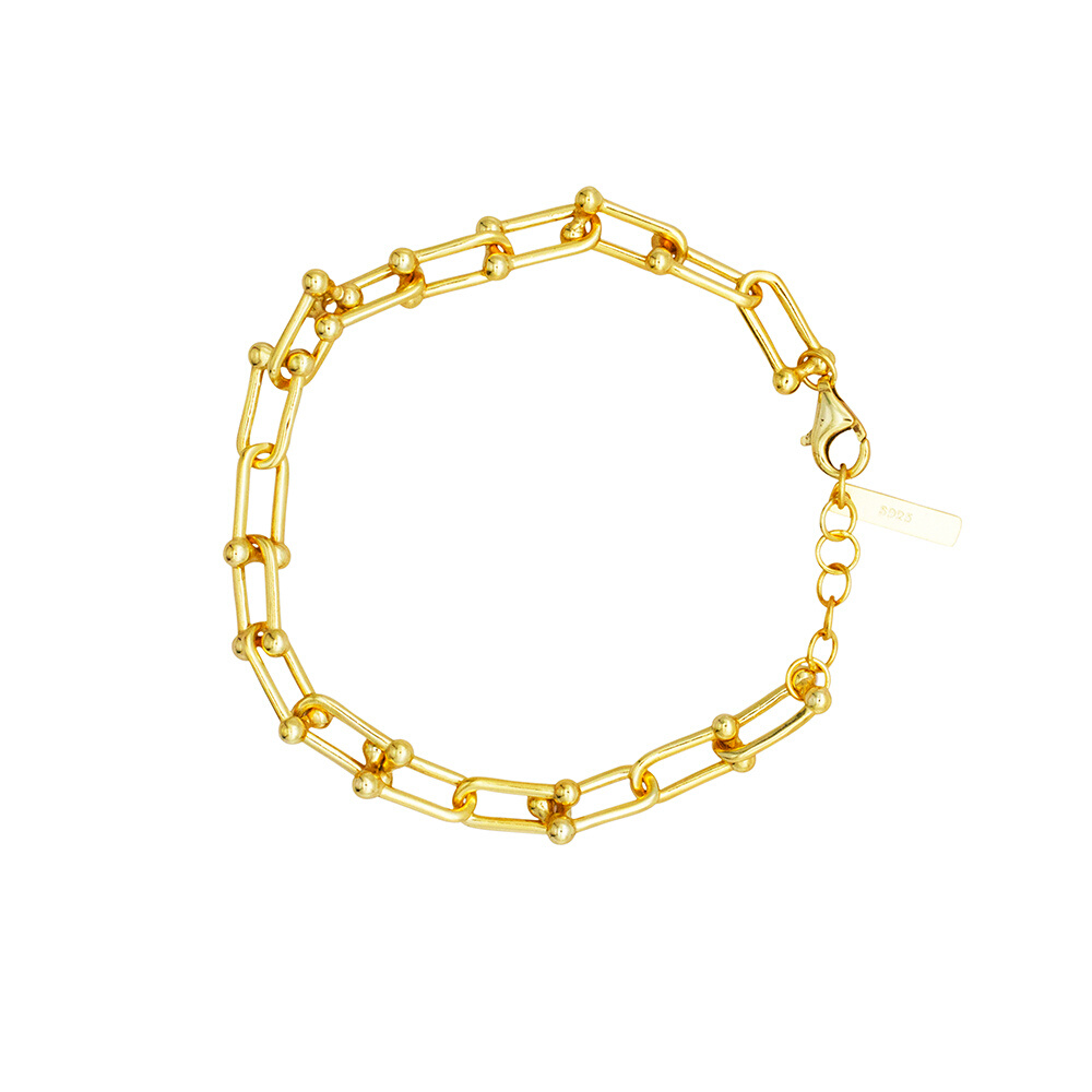 PULSERA DE ORO CON CHARM ALTA