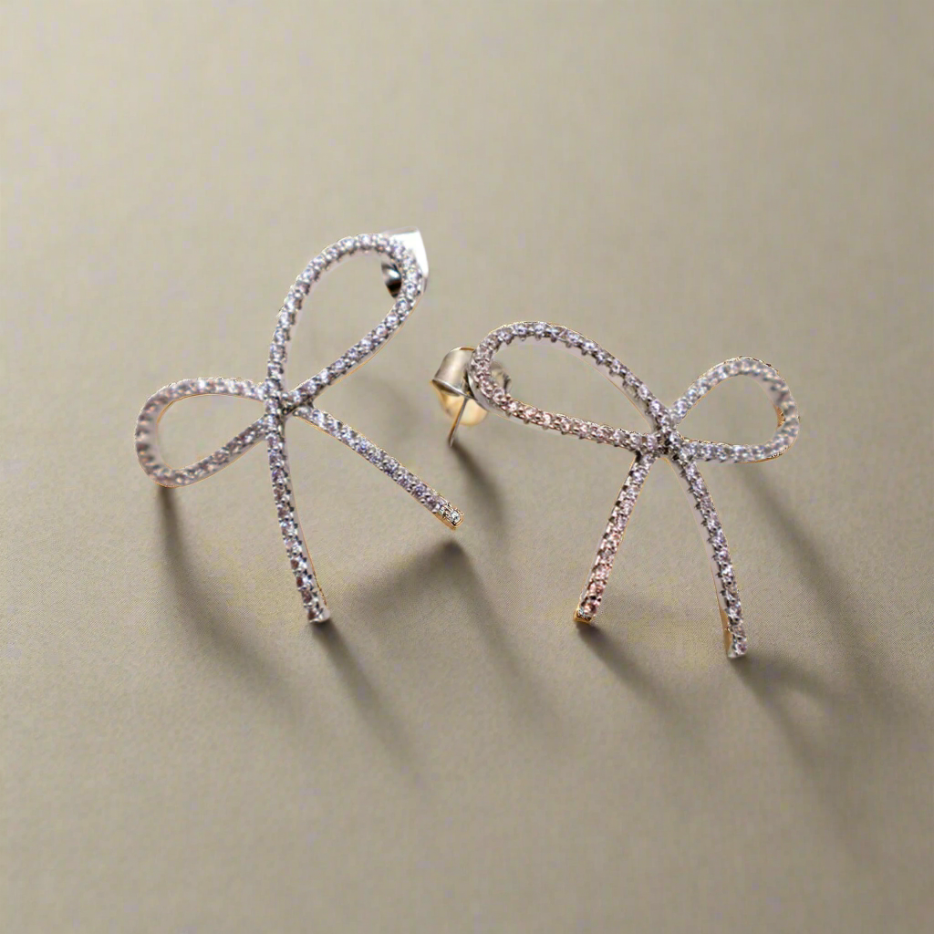 Boucles d'oreilles chics et glamour en forme de nœud papillon – Bijoux à tige en or